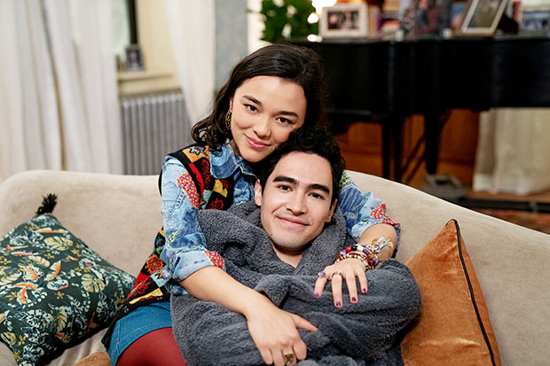 Midori and Troy sitting together on a couch